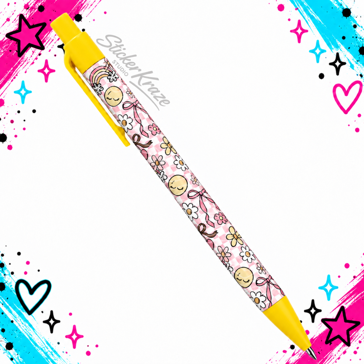Happy Little Things Pen with pink checkerboard bows flowers butterflies rainbows and cherries on a yellow click pen